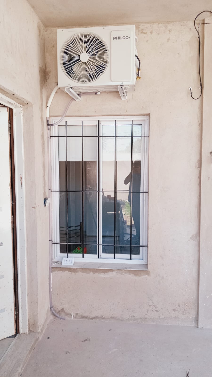 Aire en ventana pequeña